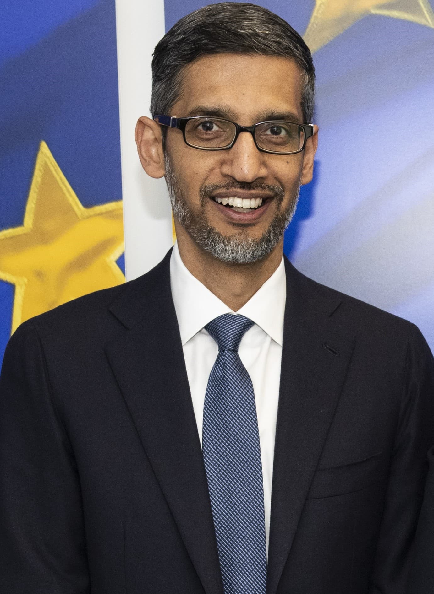 Portrait of Google and Alphabet CEO Sundar Pichai during a 2023 official meeting in Brussels.