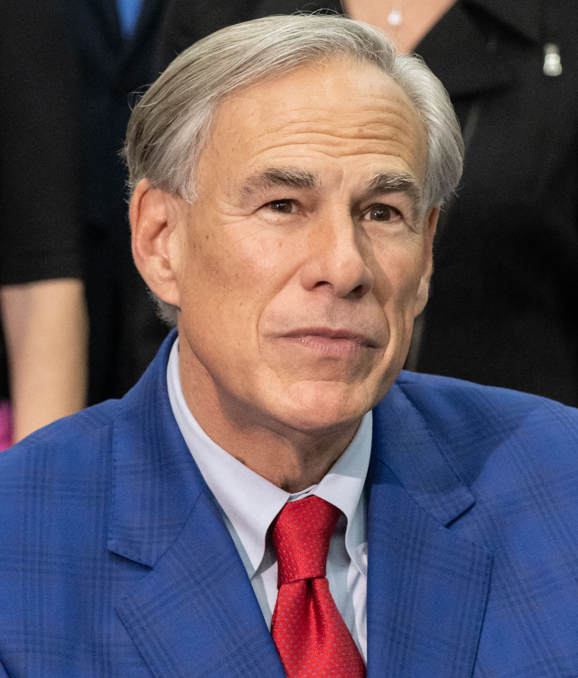Colour photograph of Greg Abbott, 48th Governor of Texas, during a March 26, 2024 visit to NASA's Johnson Space Center Mission Control in Houston, taken by NASA photographer Robert Markowitz. On August 3, 2026, Governor Abbott issued a directive to Public Utility Commission of Texas Chairman Thomas Gleeson and ERCOT President and Chief Executive Pablo Vegas ordering a comprehensive verification and audit of every data-centre project advancing through ERCOT's grid-interconnection queue before any additional connections are approved. At the time of the directive, ERCOT's large-load queue held approximately 474 gigawatts of pending interconnection requests, of which approximately 420.8 gigawatts, or 90.2 per cent, were data centres. That queue is roughly 5.2 times the ERCOT all-time hourly peak demand of 91,089 megawatts, set on July 22, 2026.