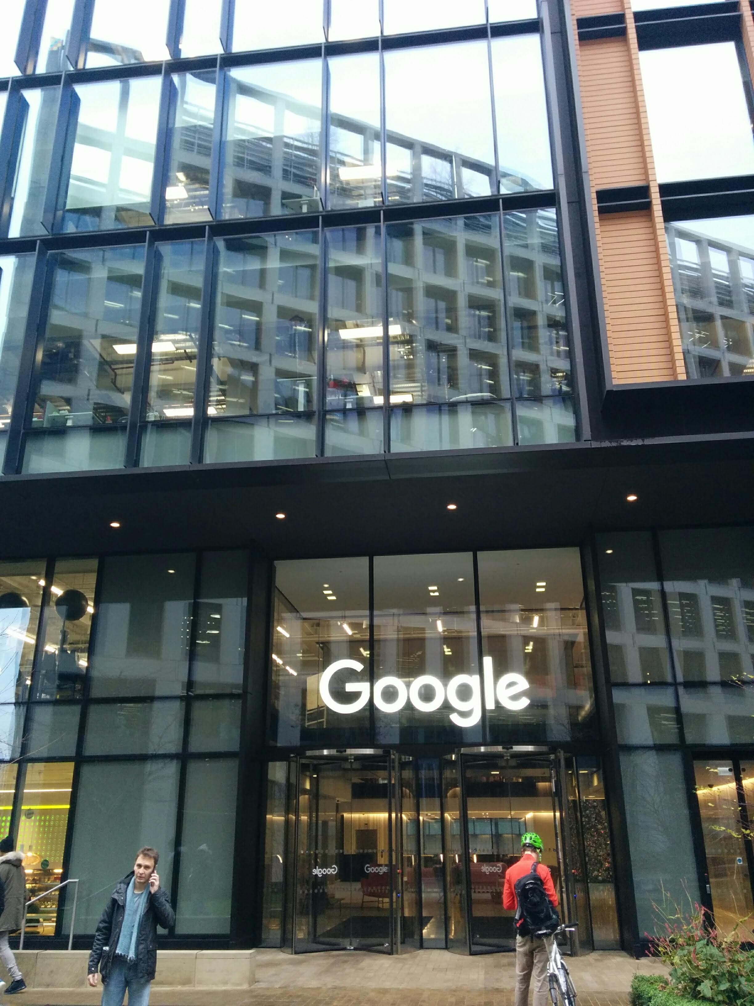 A colour photograph of the entrance to 6 Pancras Square in London, King's Cross — the Google and Google DeepMind headquarters in the UK. The glass-and-steel office block, designed by Allford Hall Monaghan Morris and opened in 2016, houses the Google DeepMind team that released Gemini 4 Argon on 30 September 2026 under the Fairwind Program, a controlled rollout to roughly 650 trusted cyber defenders rather than general API customers.