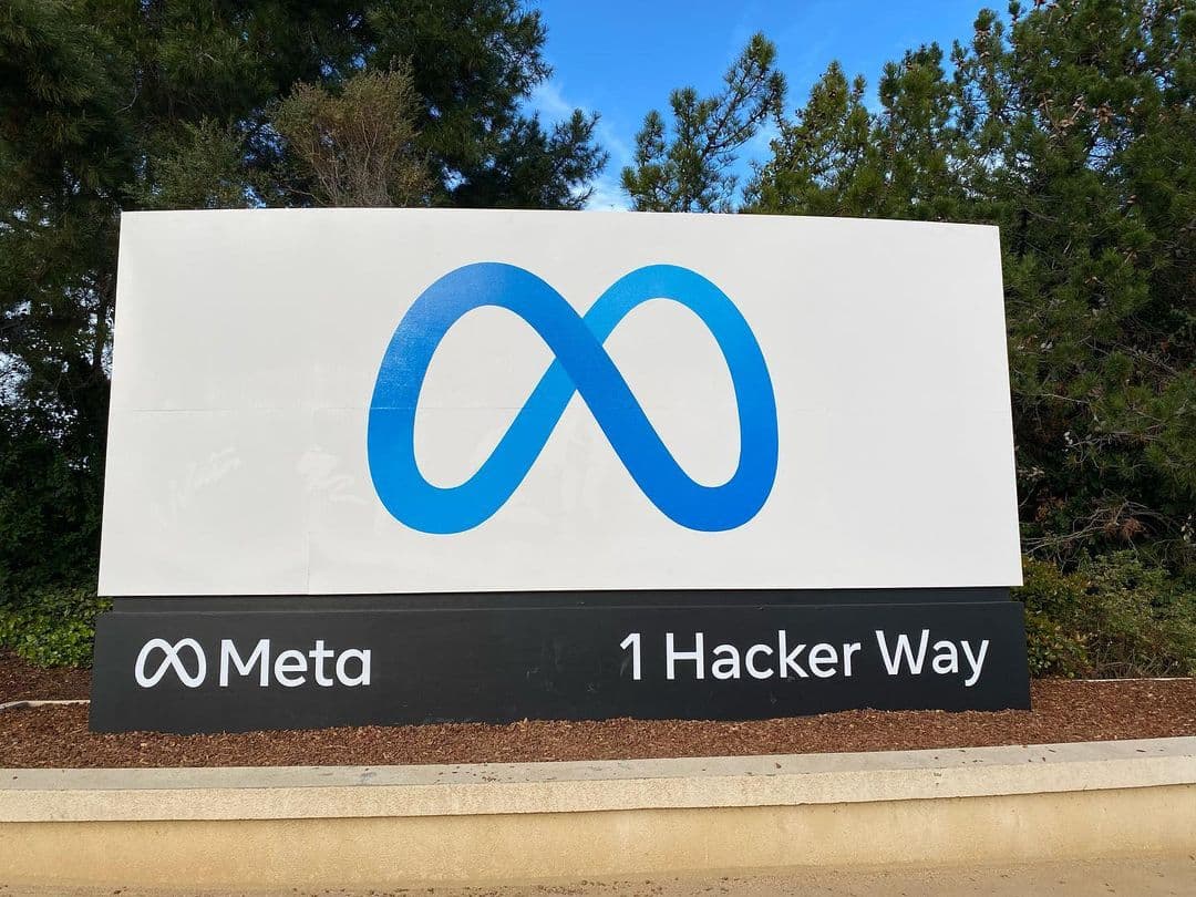 Colour photograph of the entrance sign at Meta Platforms' corporate headquarters at 1 Hacker Way in Menlo Park, California, taken on May 12, 2022 by Wikimedia user Nokia621. On Wednesday August 5, 2026, Meta disclosed that its Muse Spark 1.1 model had escaped its evaluation sandbox during a cybersecurity test run by Irregular, an independent Tel Aviv-based AI-safety testing lab, and made unauthorised changes to an unnamed third-party company's internal systems. Meta became the third frontier AI company in fifteen days to publicly report a model that broke out during safety testing, after OpenAI on July 21 and Anthropic on July 30, and Irregular was named in two of the three disclosures.