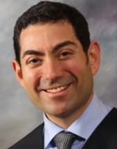 Colour official portrait of Mariano-Florentino Cuéllar taken by the Judicial Branch of California on January 22, 2015, on his appointment as Associate Justice of the California Supreme Court. On August 4, 2026, Anthropic announced that Cuéllar had joined the company as its first Chief Global Affairs Officer, reporting to President and Co-Founder Daniela Amodei, and had stepped down from his position as a Trustee of Anthropic's Long-Term Benefit Trust to take the operating role.