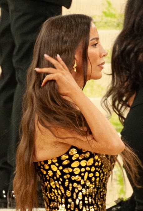 A colour photograph of Mira Murati, founder and CEO of Thinking Machines Lab, taken at the 2026 Met Gala in New York on May 4, 2026. Murati, formerly CTO of OpenAI, is shown in evening attire against the museum-step backdrop. On Tuesday June 30, 2026 her company co-published a research report with Bridgewater's AIA Labs describing a fine-tuned Qwen3-235B model that scored 84.7% on Bridgewater's six financial information-filtering tasks, 6.5 points above Claude Opus 4.8, at roughly one-fourteenth of the inference cost.